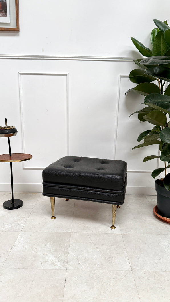 Pouf en skaï noir