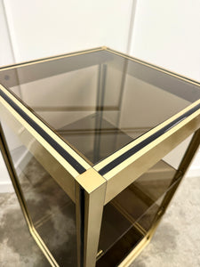 Console dorée et verre fumé