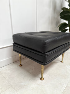 Pouf en skaï noir