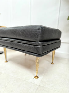 Pouf en skaï noir