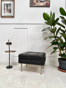 Pouf en skaï noir