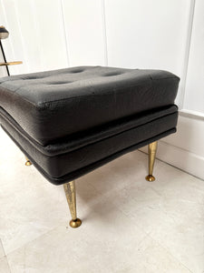 Pouf en skaï noir
