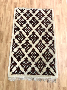 Tapis beige motifs ethniques