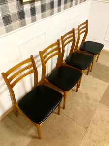 4 chaises scandinave assise skaï